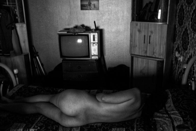 Nude body of a woman on the bed in the room, in Tabriz, Iran, on October 12, 2017. In 1936, as part of westernizing crusade, Reza Shah banded the veil. To enforce this decree, the police were ordered to physically remove the veil from any woman who wore it in public. After the revolution in 1979 the Hijab has once again become a symbol, this time of the ideology and power of a regime over its people. In both opposing regimes, the female body became an ideological tool as well as media's propaganda.


Labyrinth explores the socio-psychological experiences of Iran’s post-revolutionary generation, sharing a window into the experience of a repressed youth facing high rates of unemployment and anxiety for the future.